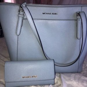 Barely used Michael Kors bag with matching wallet